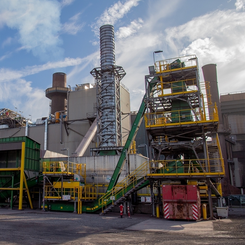 ArcelorMittal start biokoolcentrale op afvalhout op in haven van Gent